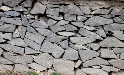 old stone wall of stones