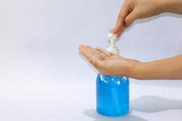 hand gel alcohol, hand sanitizer in pump bottle with hands and white background.