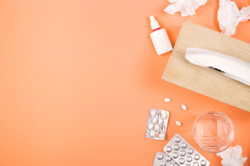 Allergic rhinitis or flu, treatment with drops and tablets. Layout on a pink background with place...