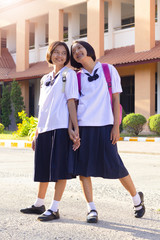 Happy young Asian girl at School with uniform. © Destiny