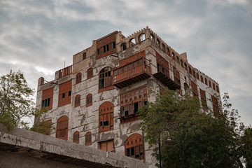 Fototapeta na wymiar Historic City of Jeddah, old Houses , in a cloudy sky Saudi Heritage. Jeddah, Saudi Arabi 2020