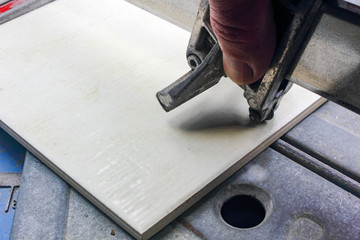 close up of a tile cutting machine