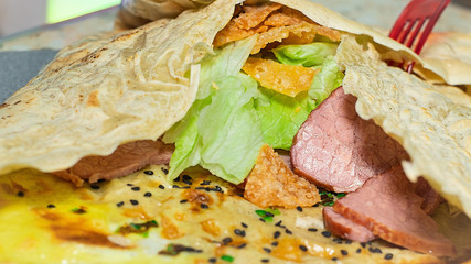 Fresh food: crepe, salad, meet, crispy chips