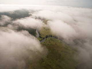 Fototapeta premium Summer nature landscape aerial panorama. Morning fog over river, meadow and forest.