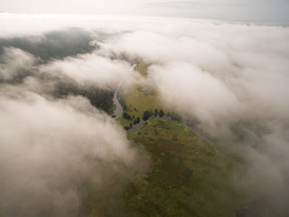 Summer nature landscape aerial panorama. Morning fog over river, meadow and forest.