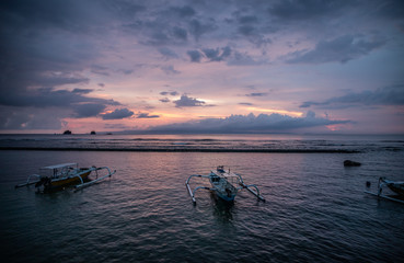 Fototapeta na wymiar fishing boat at dawn