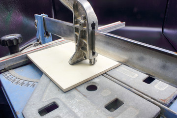 close up of a tile cutting machine