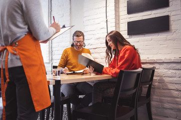 Young People Ordering Food in Fast Food Restaurant	