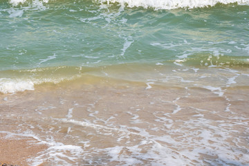 soft wave clear blue transparency sea ocean water and rocks at the bottom of the tropical paradise summer sea view at lan Island, Pattaya beach, Chonburi, Thailand.