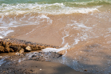 soft wave clear blue transparency sea ocean water and rocks at the bottom of the tropical paradise summer sea view at lan Island, Pattaya beach, Chonburi, Thailand.