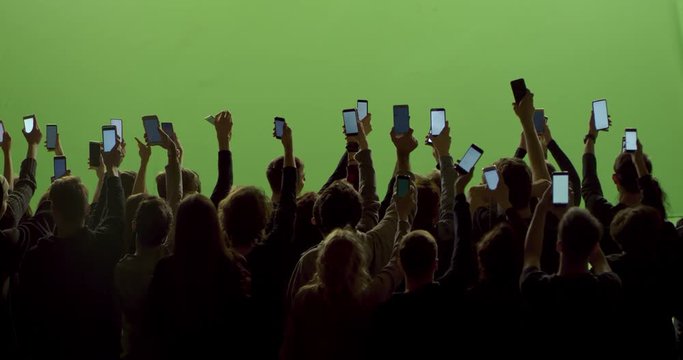 GREEN SCREEN Back view huge crowd of people with phones in hands at live concert or show. Shot on RED Helium 8K, Prores 4444