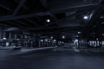 Chicago, night traffic between bridges and skyscrapers