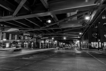 Chicago, night traffic between bridges and skyscrapers