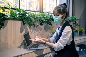 Pretty Asian blogger washing  hands using gel and wear protective masks prevent PM 2.5 and corona...