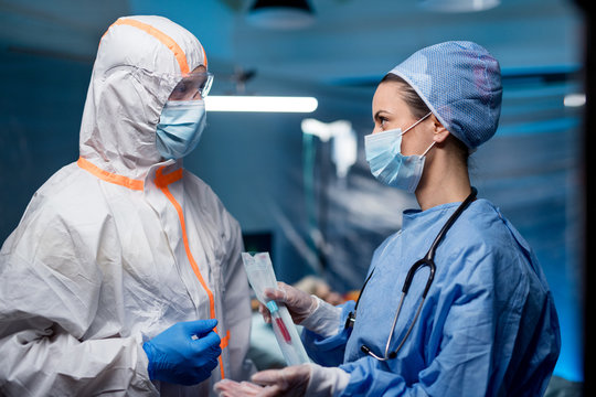 Doctors holding samples in hospital, coronavirus concept.
