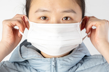 Girl in a mask to prevent virus transmission