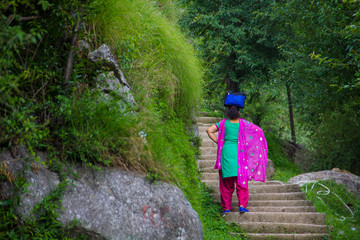 Indian woman balancing 