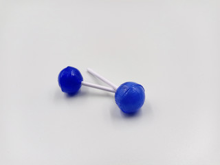 blue lollipops on white background