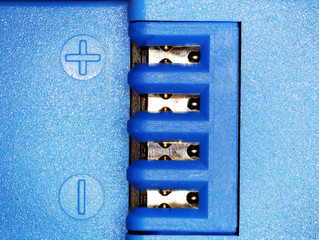 Ultra Macro from the battery for an action camera in blue plastic with markings for the poles