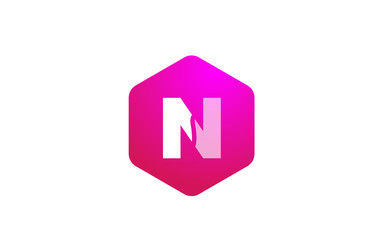 pink white polygon N alphabet letter logo icon with modern design for business and company