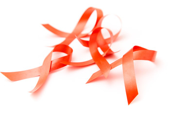 Red ribbon on background paper