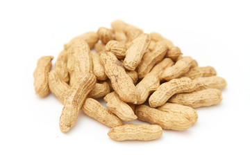 A pile of peanuts in a bamboo basket