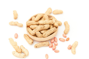 A pile of peanuts in a bamboo basket