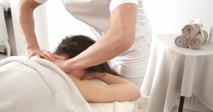 Spanish head massage. relaxing massage for face Massage therapist at Spa salon