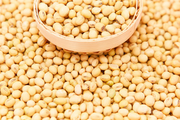 A pile of soybeans in a bamboo basket