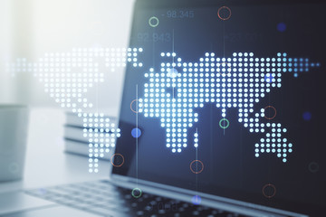 Multi exposure of abstract creative digital world map on modern laptop background, tourism and traveling concept concept