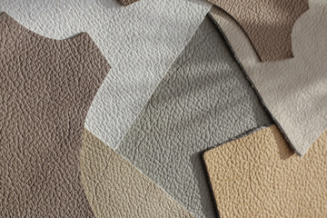 Leather samples as background, close up
