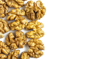 Peeled walnut halves isolated on a white background
