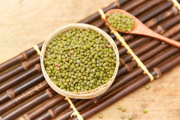 A pile of green beans in the bamboo basket