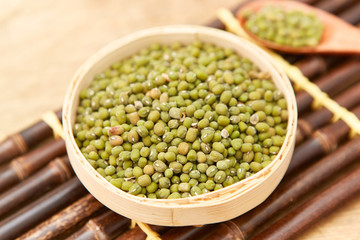 A pile of green beans in the bamboo basket