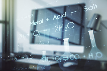 Double exposure of creative chemistry concept on laptop background, research and development concept