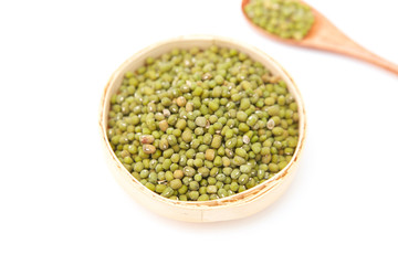 A pile of green beans in the bamboo basket