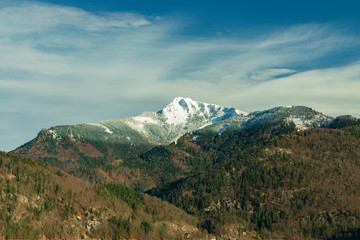 soft focus Alps mountains picturesque central European landscape scenic view spring time lonely snowy peak gorgeous nature
