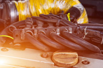 Car with open hood.Battery. Details of new car engine.