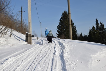 children on a walk in winter