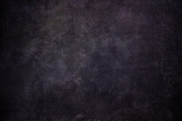 Dark purple grungy backdrop or texture