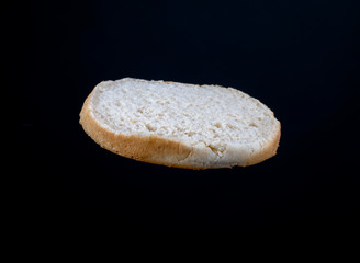 Bottom of hamburger bread with black background