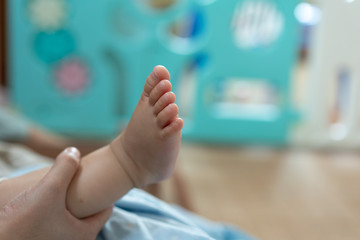 Naklejka premium Close up of sleeping baby's feet