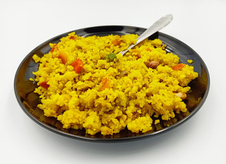 healthy poha dish in black plate 