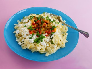 pasta with cheese and vegetables as vegetarian lunch meal
