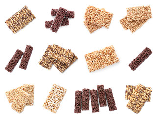Set of delicious rice crispy treats on white background, top view