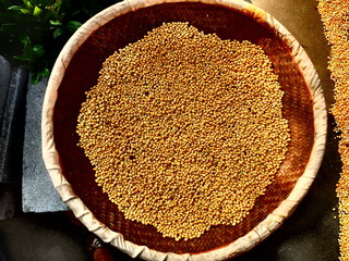 buckwheat in wooden spoon