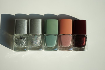 bottles of nail polish isolated on white background