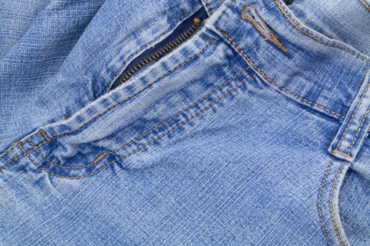 Denim Blue Jeans Zipper And Pockets As Fashion Background