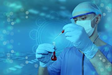 male doctor in a blue uniform with stethoscope in protective mask, glasses is conducting a...