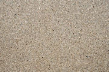 Brown eco recycled kraft paper sheet texture cardboard background